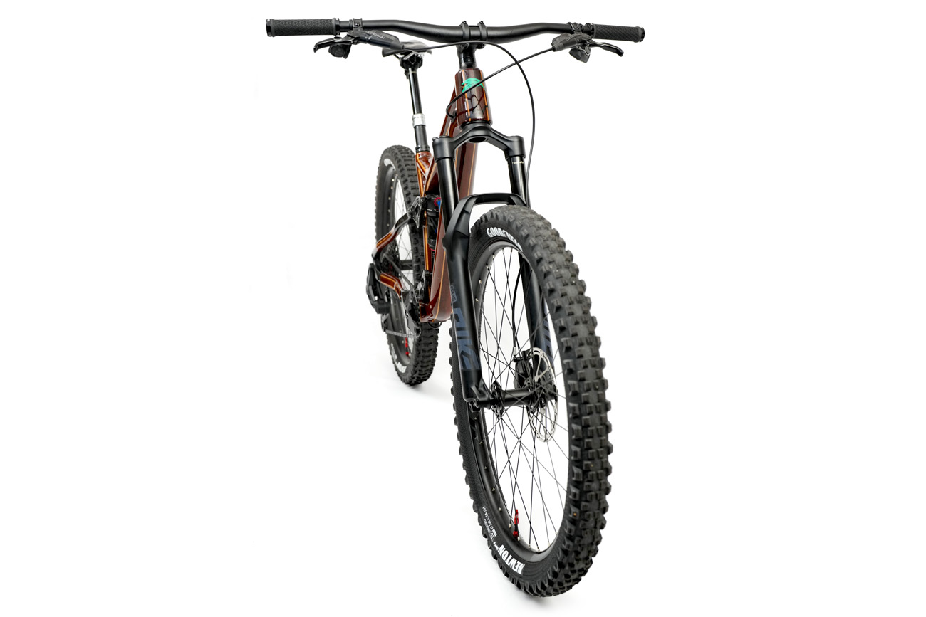 A custom wooden HTech enduro mountain bike made from Jarrah, shot from the front