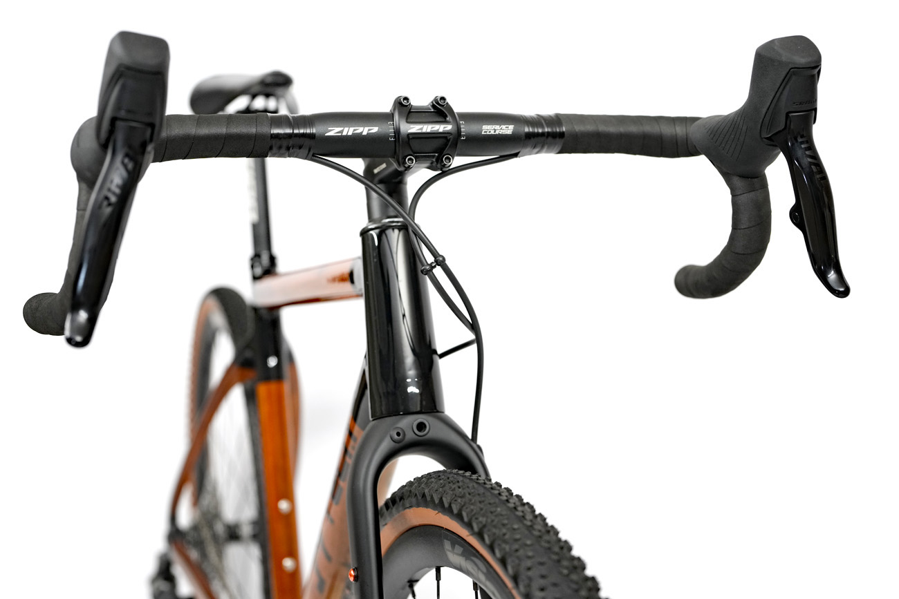HTech Variantia headtube and cockpit with SRAM Rival AXS shifters and Zipp Service Course XPLR handlebars