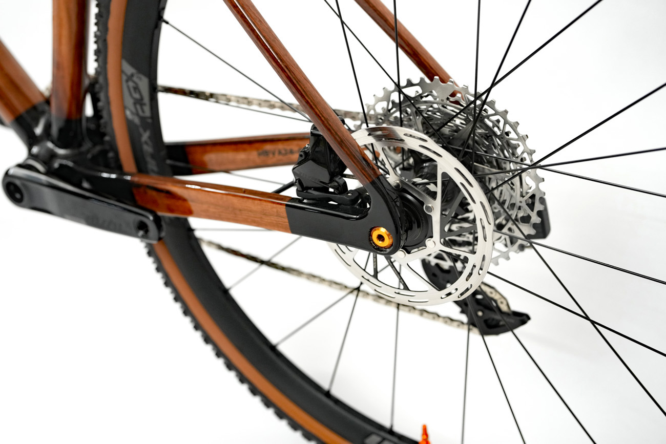 Non-drive side carbon dropout connecting SCR laminated stays and SRAM Rival flat mount brake caliper