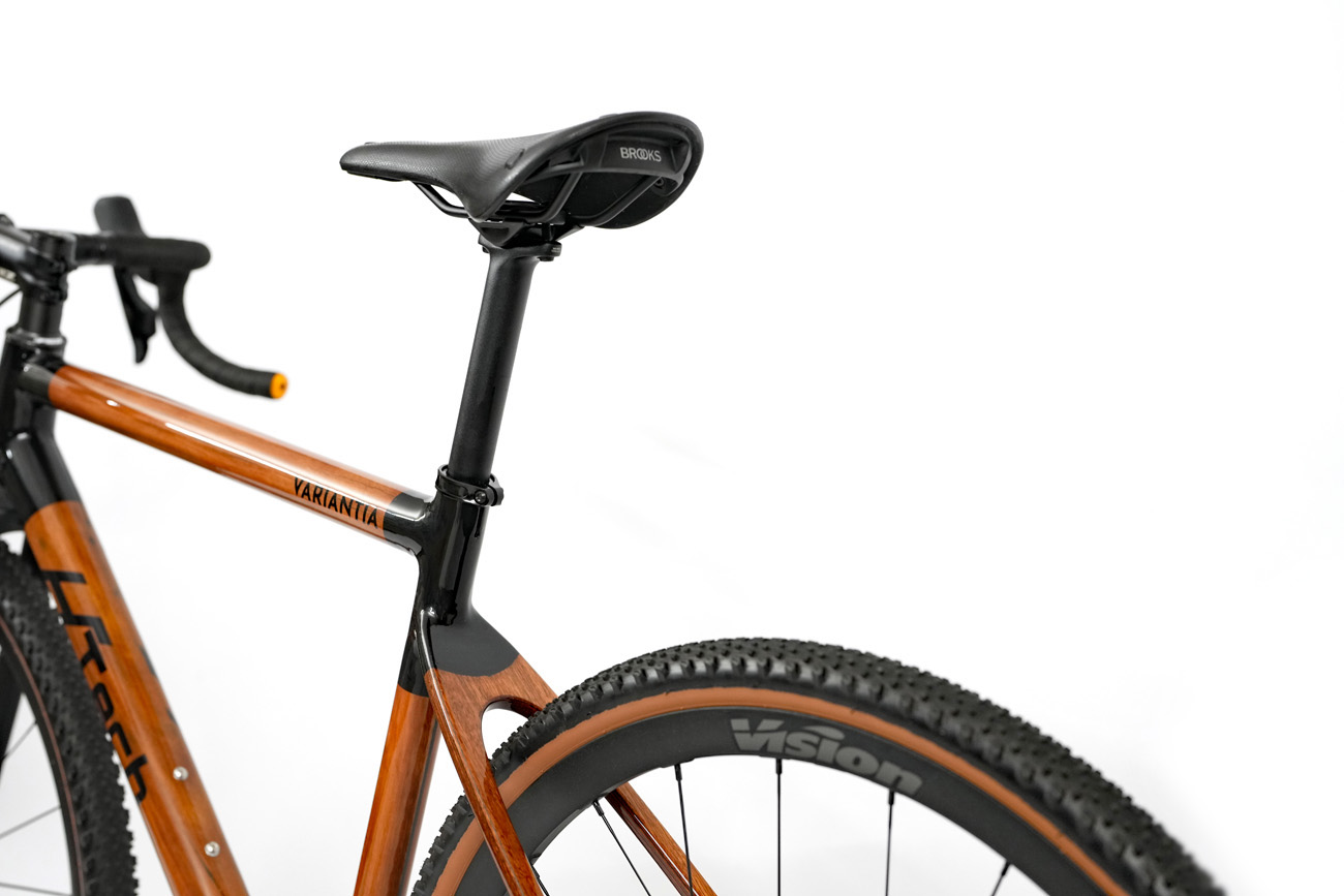 High gloss finish HTech Variantia fitted with quality components including Brooks C15 saddle and Vision Trimax wheels