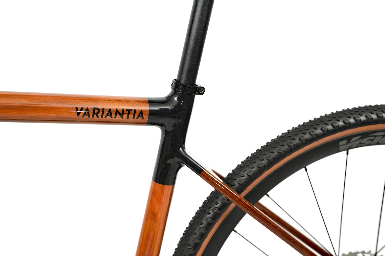 Dropped SCR laminated seat stays on the HTech Variantia frame and Variantia name on the recycled Karri HRP top tube
